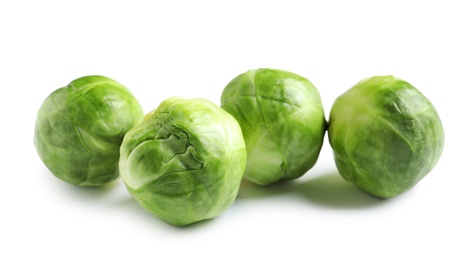 Photo of Fresh tasty Brussels sprouts on white background