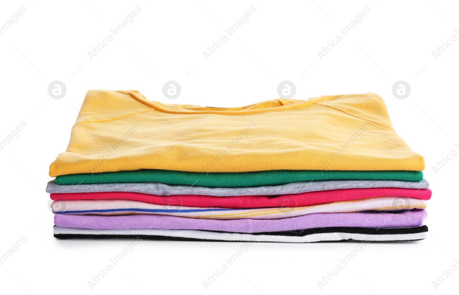 Photo of Pile of ironed clothes isolated on white