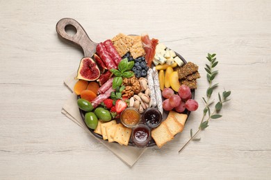 Photo of Different tasty appetizers on wooden table, flat lay