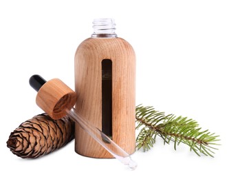 Photo of Bottle of pine essential oil and cone on white background