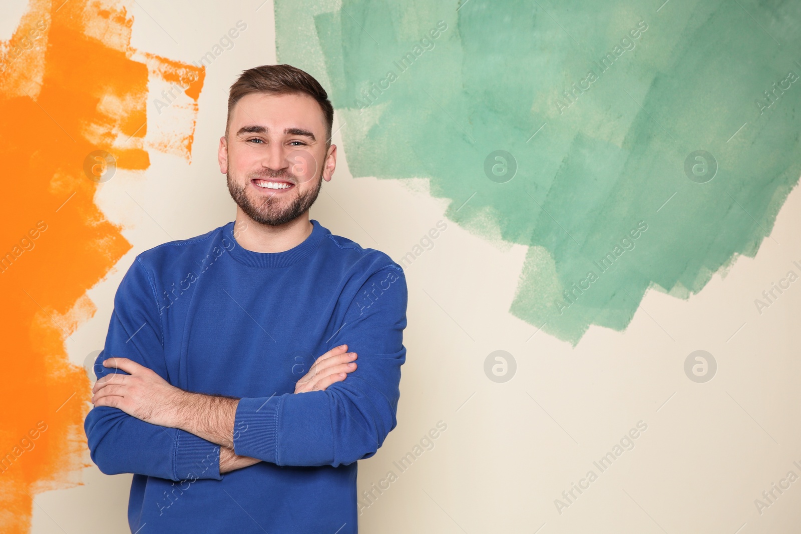 Photo of Portrait of handsome man on color background. Space for text