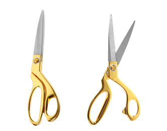 Image of New sharp gold scissors on white background, top view