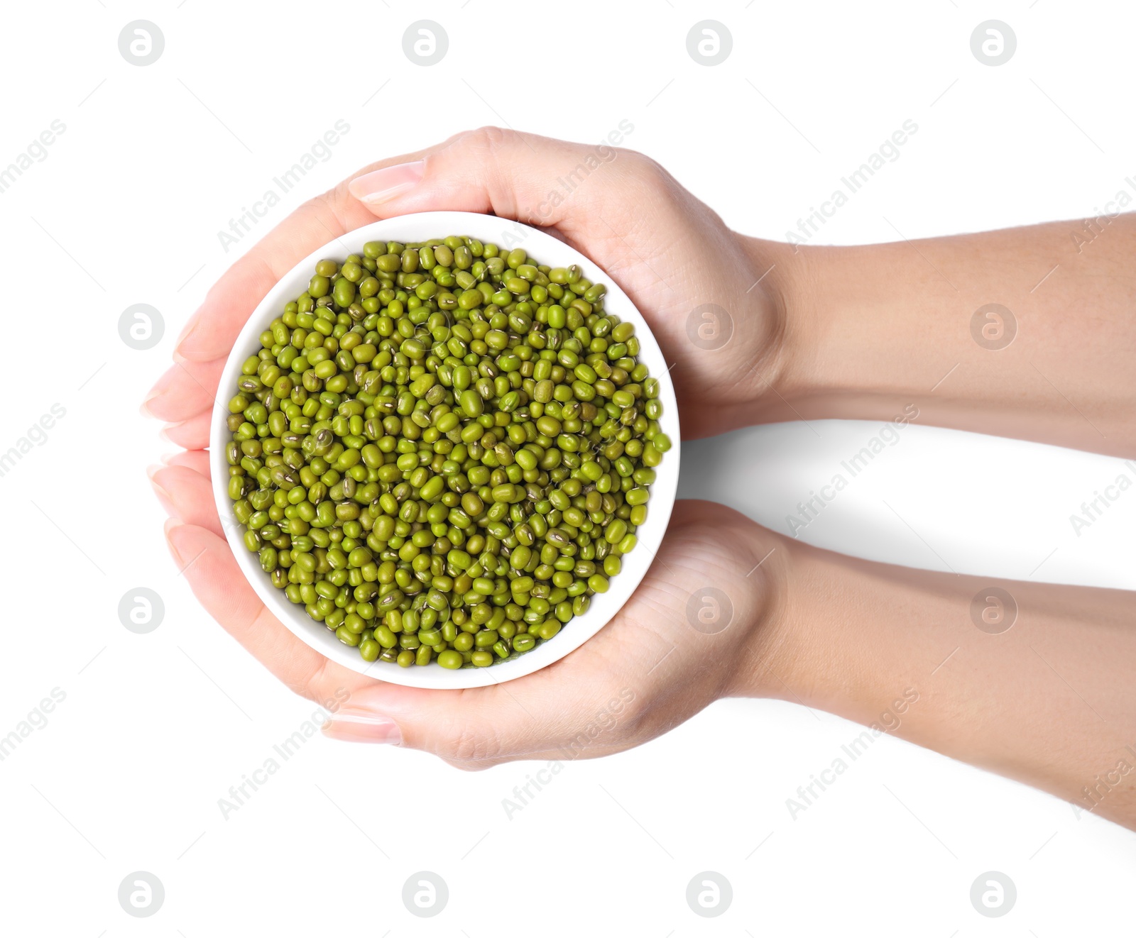 Photo of Woman holding bowl with green mung beans on white background, top view