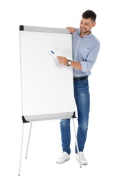 Photo of Professional business trainer near flip chart board on white background. Space for text