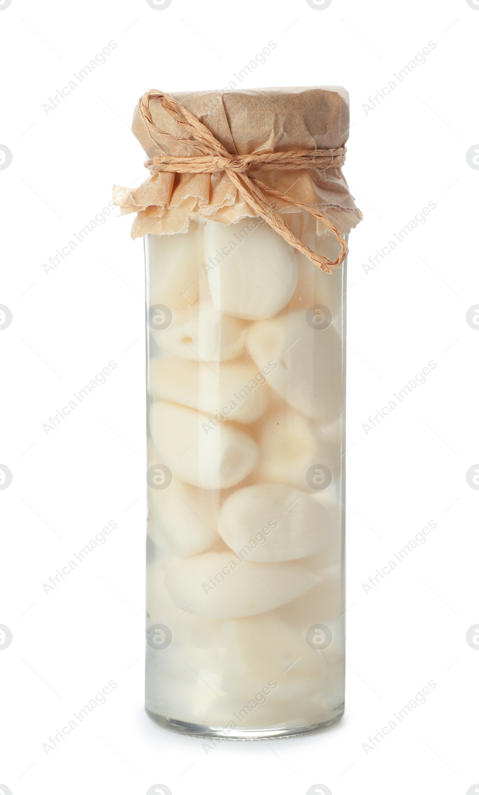 Photo of Glass jar with preserved garlic on white background