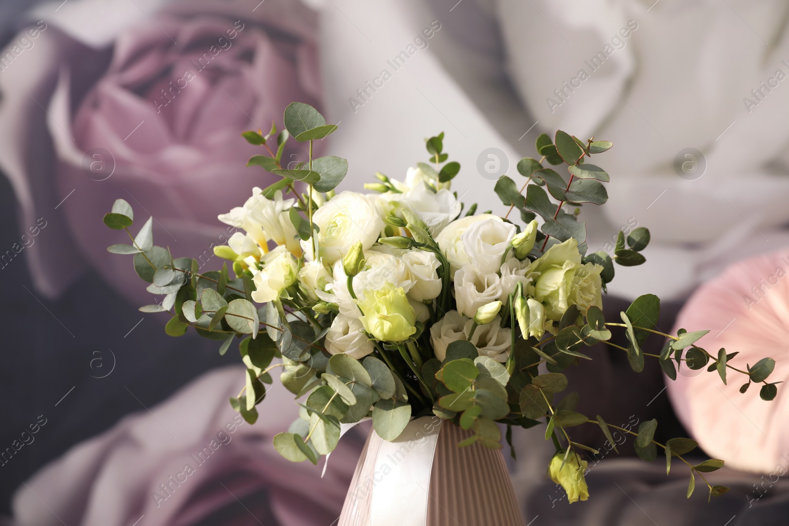 Photo of Beautiful bouquet of flowers on table in room. Stylish interior design