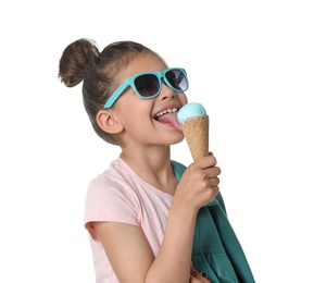 Adorable little girl with delicious ice cream on white background