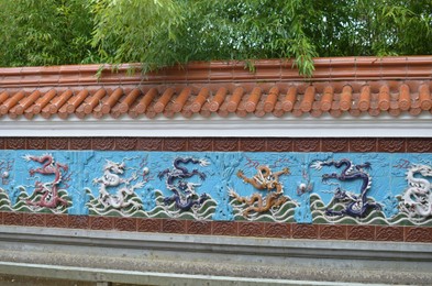 HAREN, NETHERLANDS - MAY 23, 2022: View of Nine-Dragon wall in Chinese garden