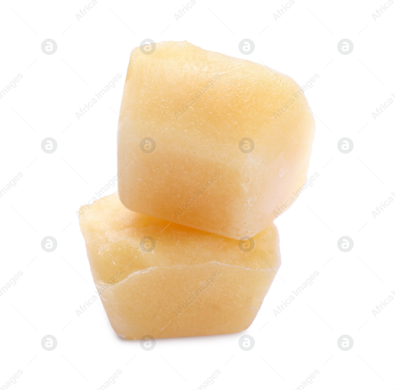 Photo of Frozen fruit puree cubes on white background