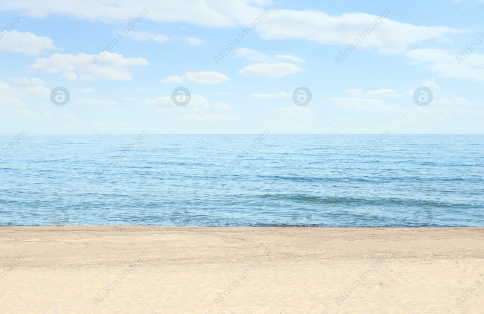 Photo of Picturesque view of sandy beach near sea