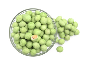 Photo of Tasty wasabi coated peanuts on white background, top view