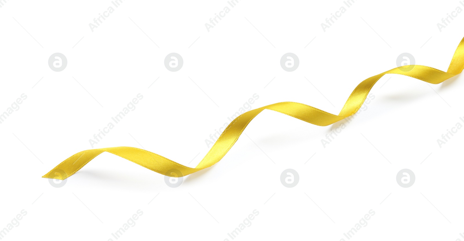 Photo of One golden satin ribbon on white background, above view