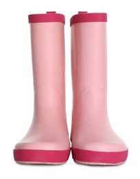 Photo of Modern pink rubber boots isolated on white
