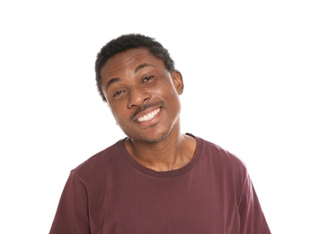 Portrait of happy African-American man on white background