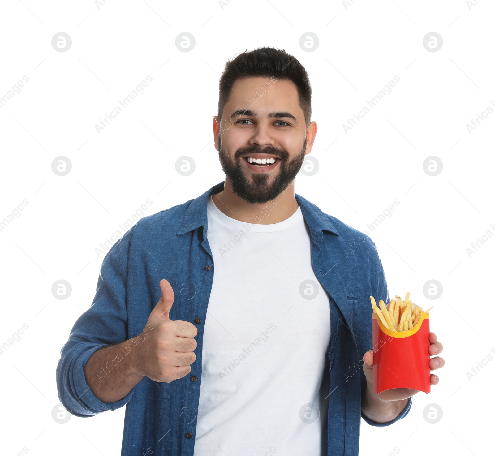 Photo of Young man with French fries on white background