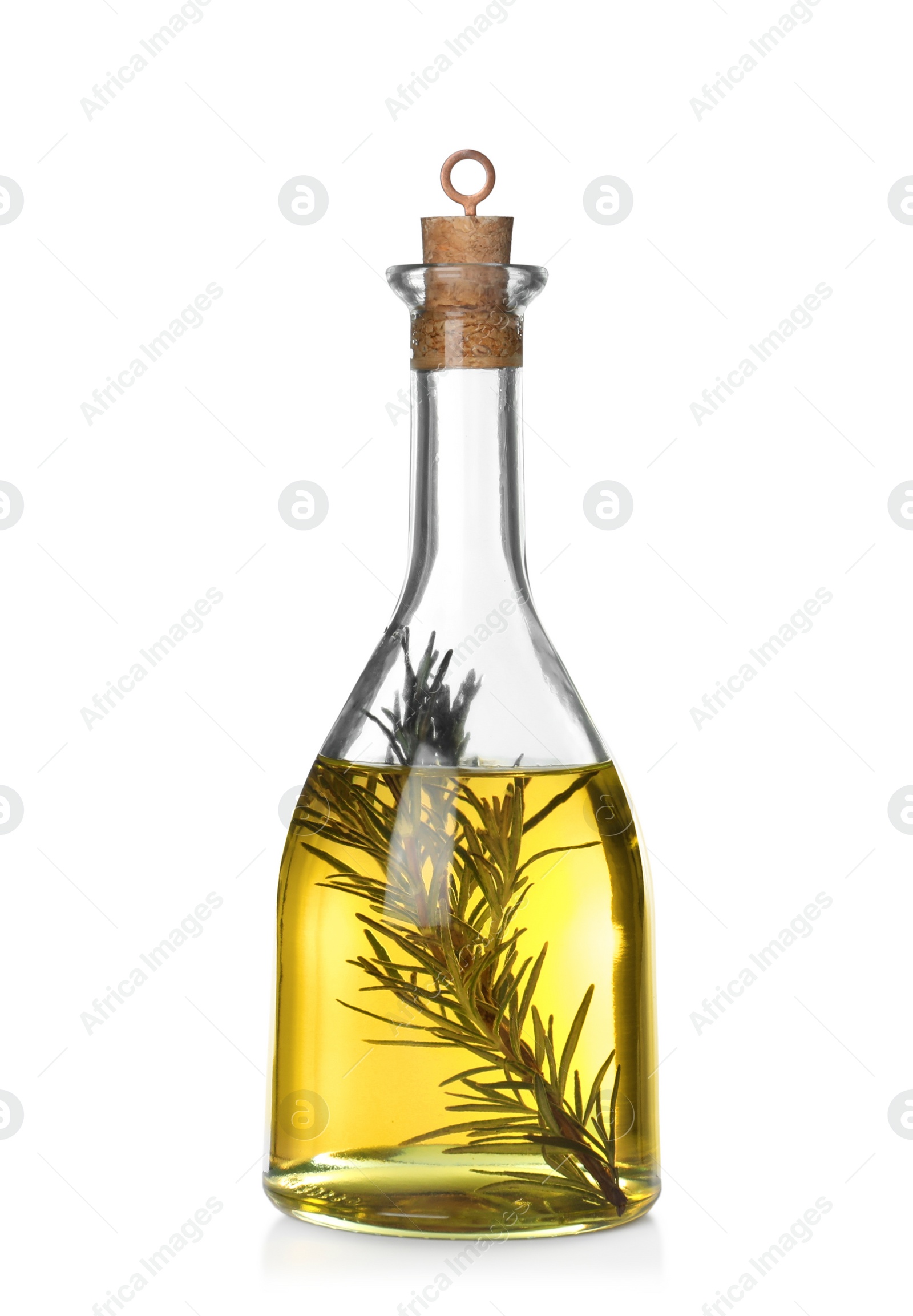 Photo of Cooking oil with rosemary in glass bottle isolated on white