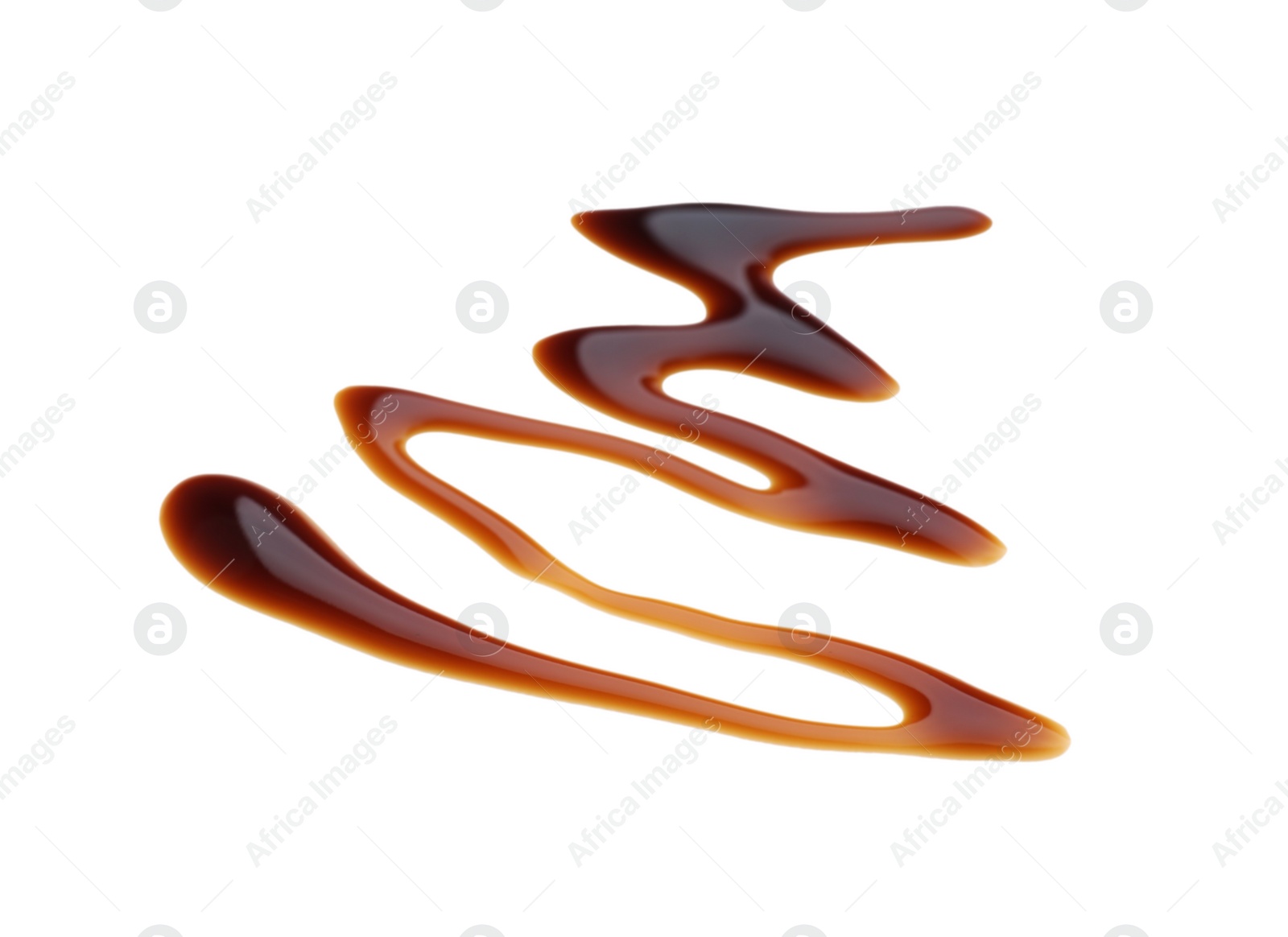 Photo of Smear of soy sauce spilled on white background