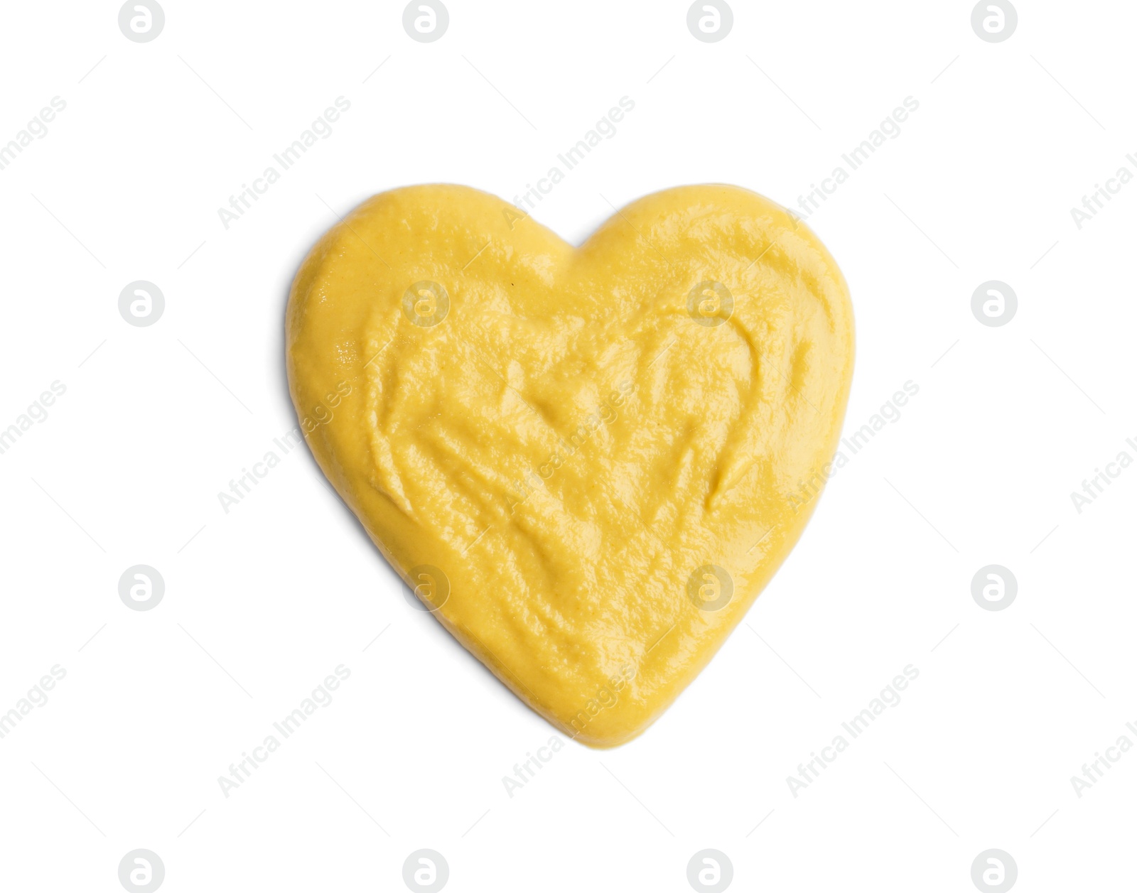 Photo of Heart made of mustard isolated on white, top view. Spicy sauce