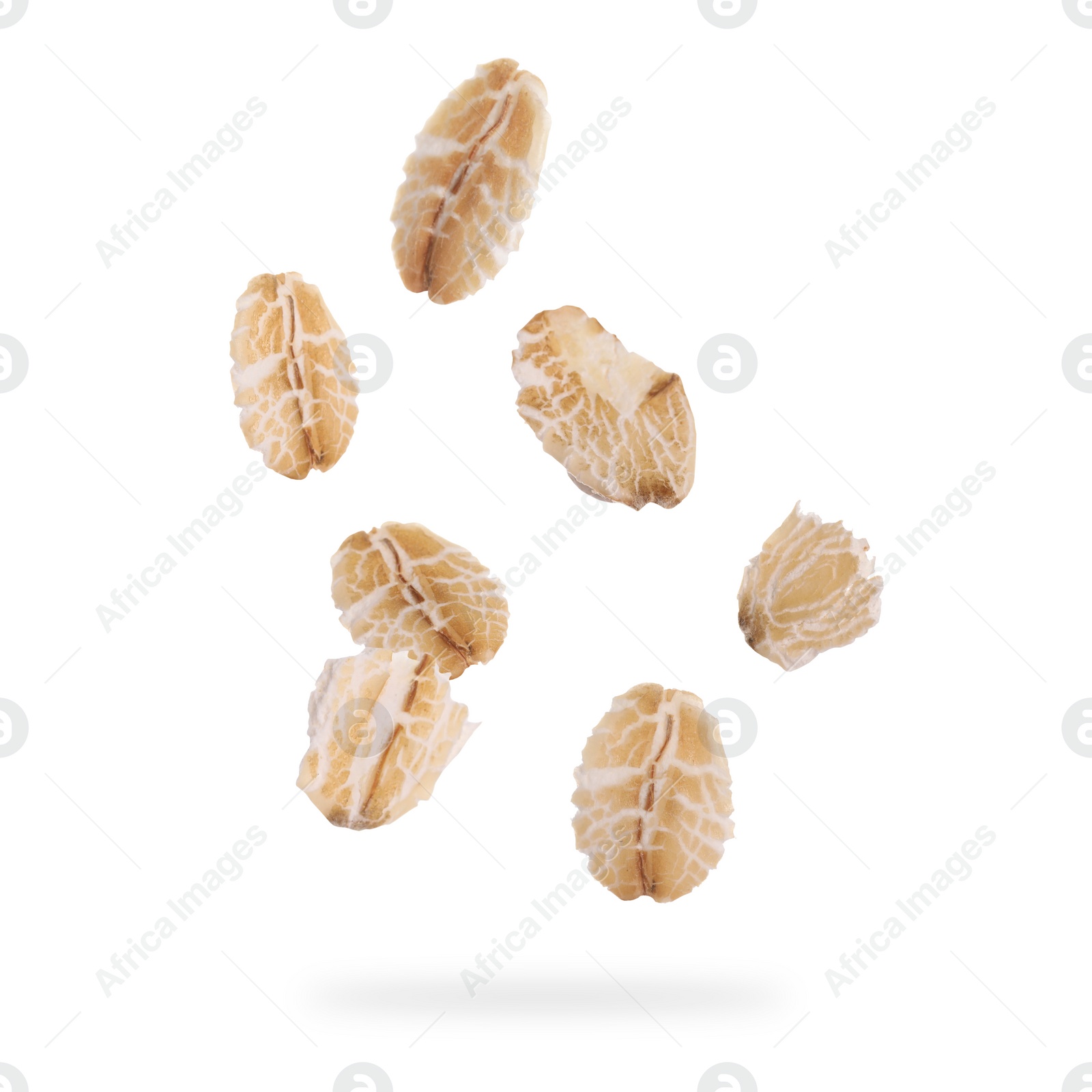 Image of Rolled oat flakes falling on white background