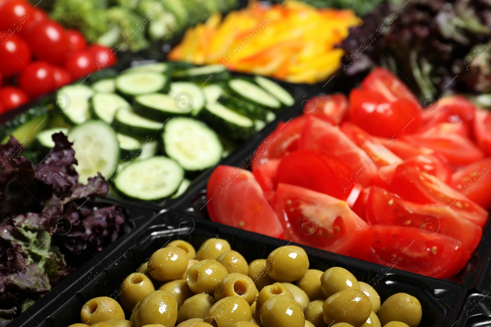 Photo of Salad bar with different fresh ingredients as background, closeup