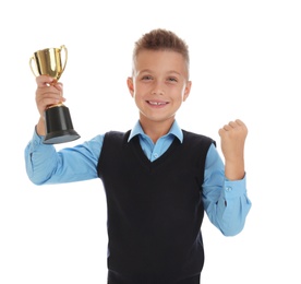 Photo of Happy boy in school uniform with golden winning cup isolated on white