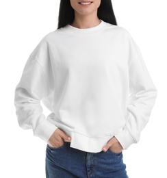 Photo of Young woman in sweater isolated on white, closeup. Mock up for design