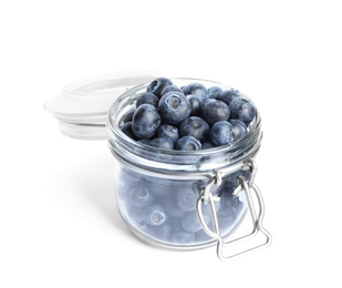 Photo of Fresh tasty blueberries in glass jar isolated on white