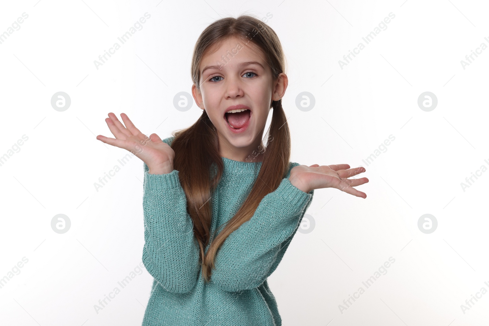 Photo of Portrait of surprised girl on white background