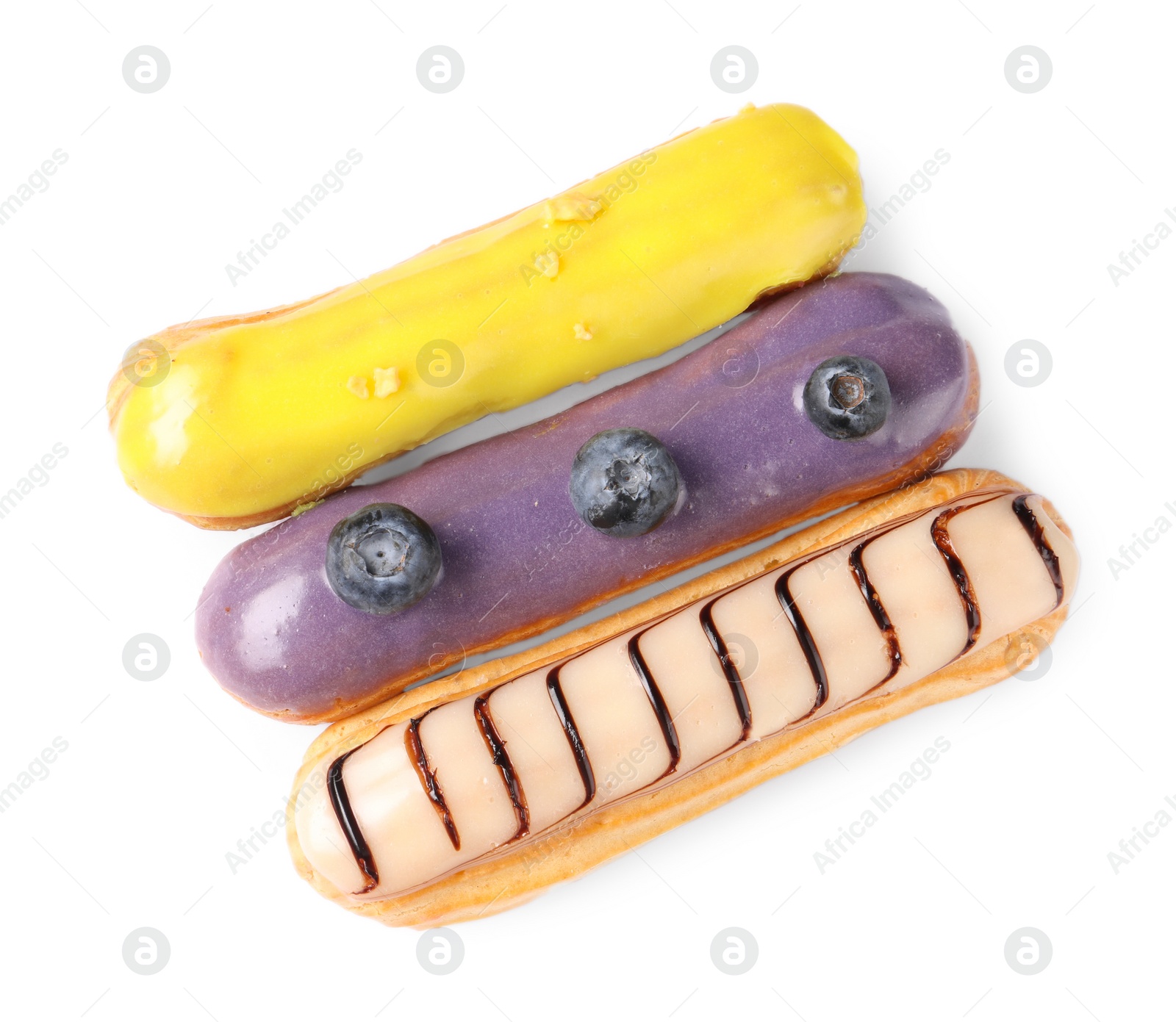 Photo of Delicious eclairs covered with glaze isolated on white, top view