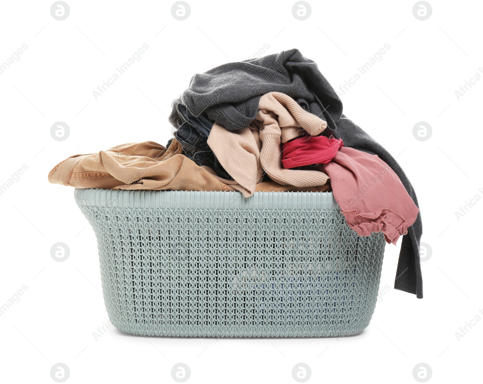 Photo of Plastic laundry basket full of clothes isolated on white