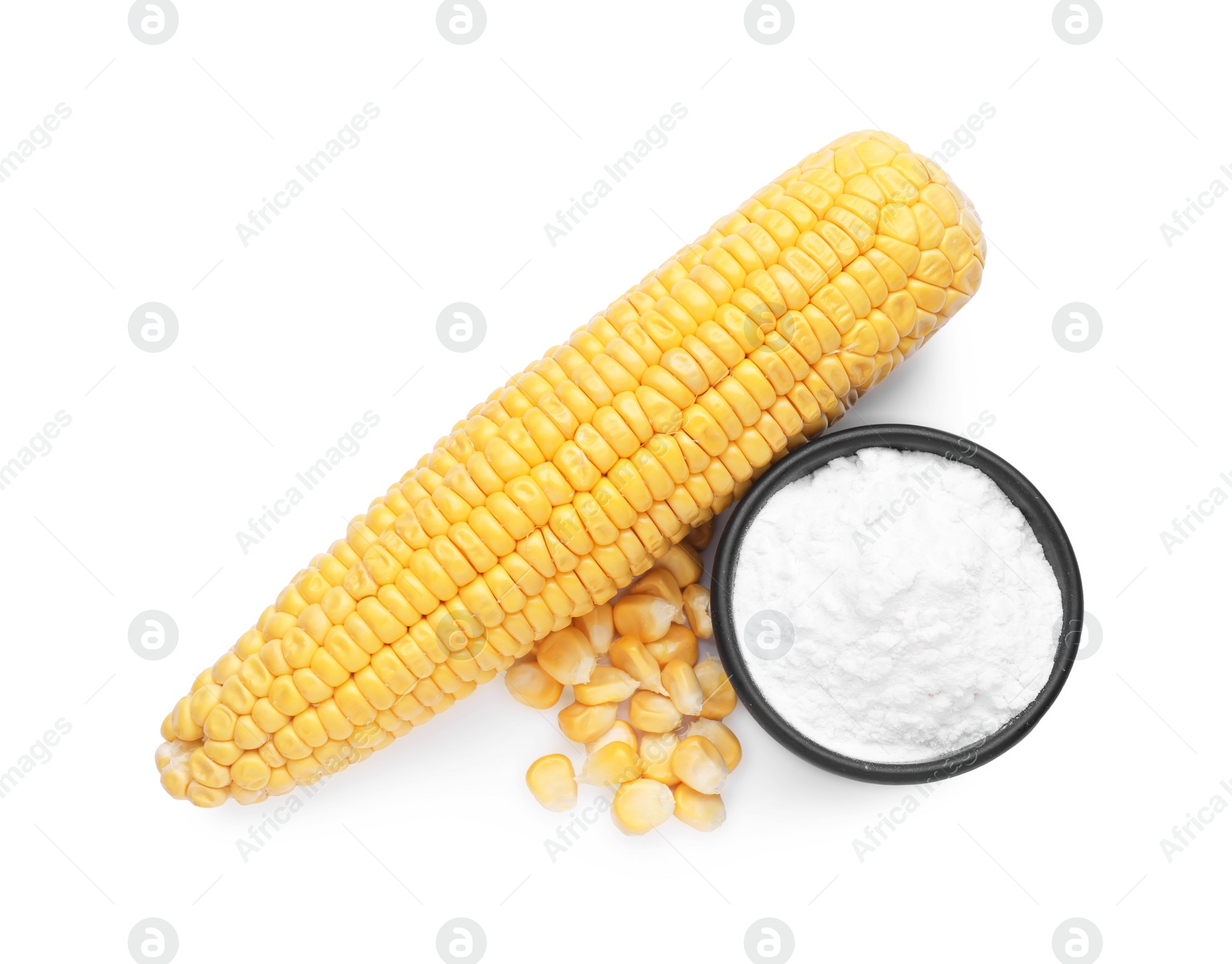 Photo of Bowl with corn starch, ripe cob and kernels isolated on white, top view