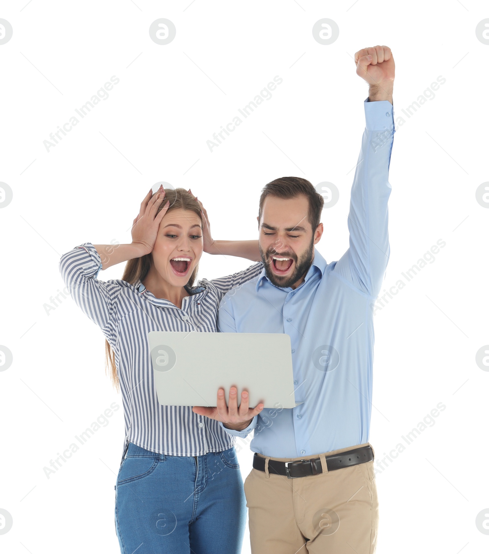 Photo of Emotional young people with laptop celebrating victory on white background