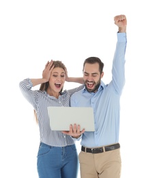 Emotional young people with laptop celebrating victory on white background