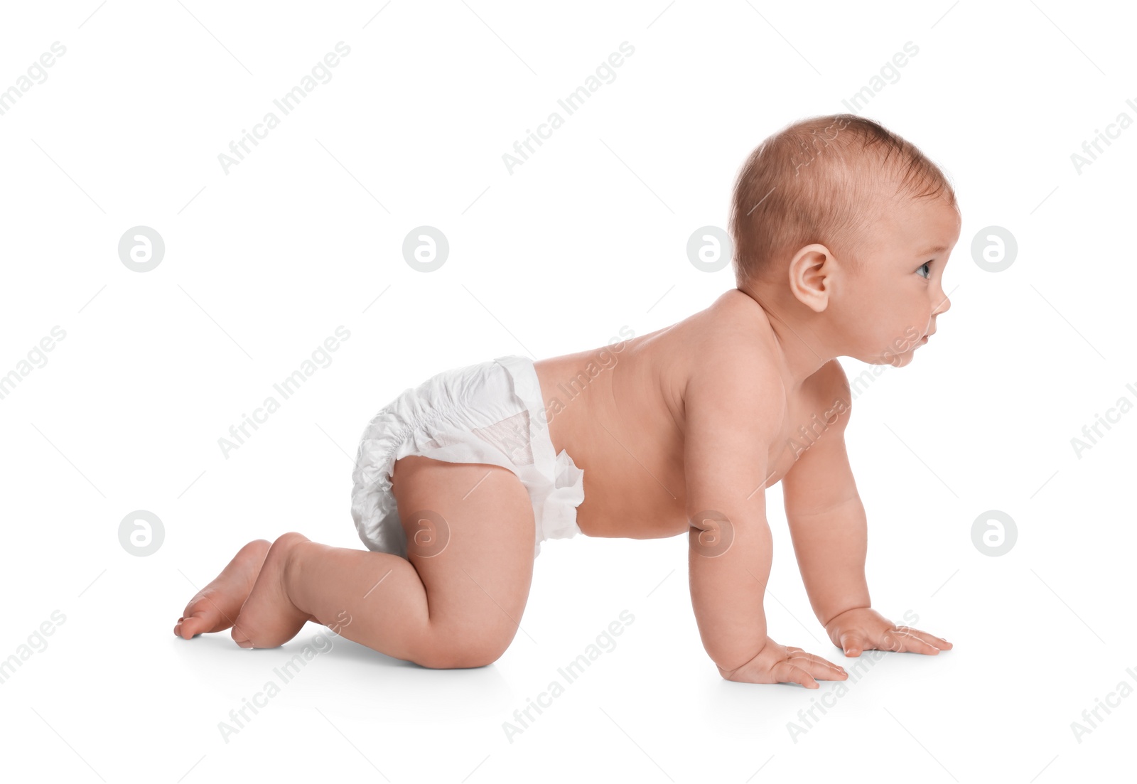 Photo of Cute little baby in diaper crawling on white background