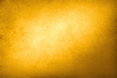 Image of Golden textured surface as background, closeup view