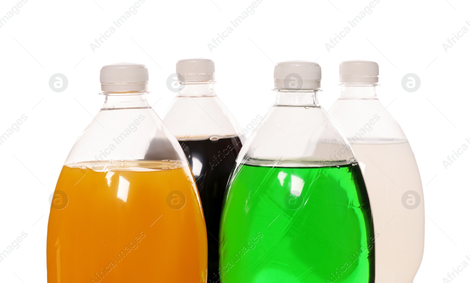 Photo of Bottles of soft drinks on white background, closeup