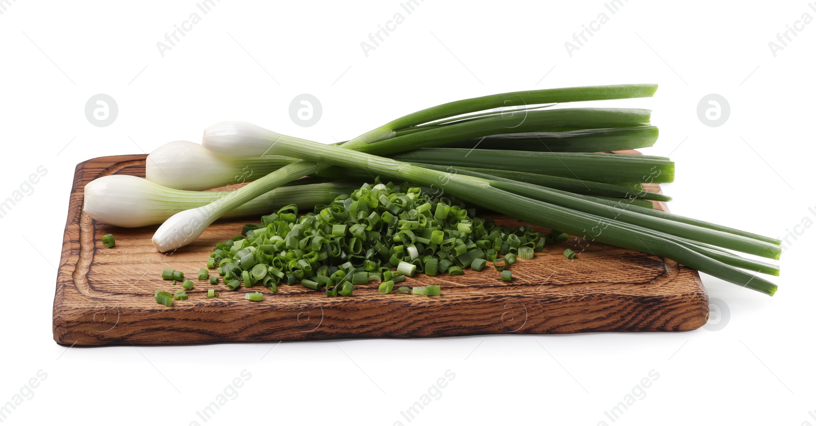 Photo of Whole and chopped green onion isolated on white