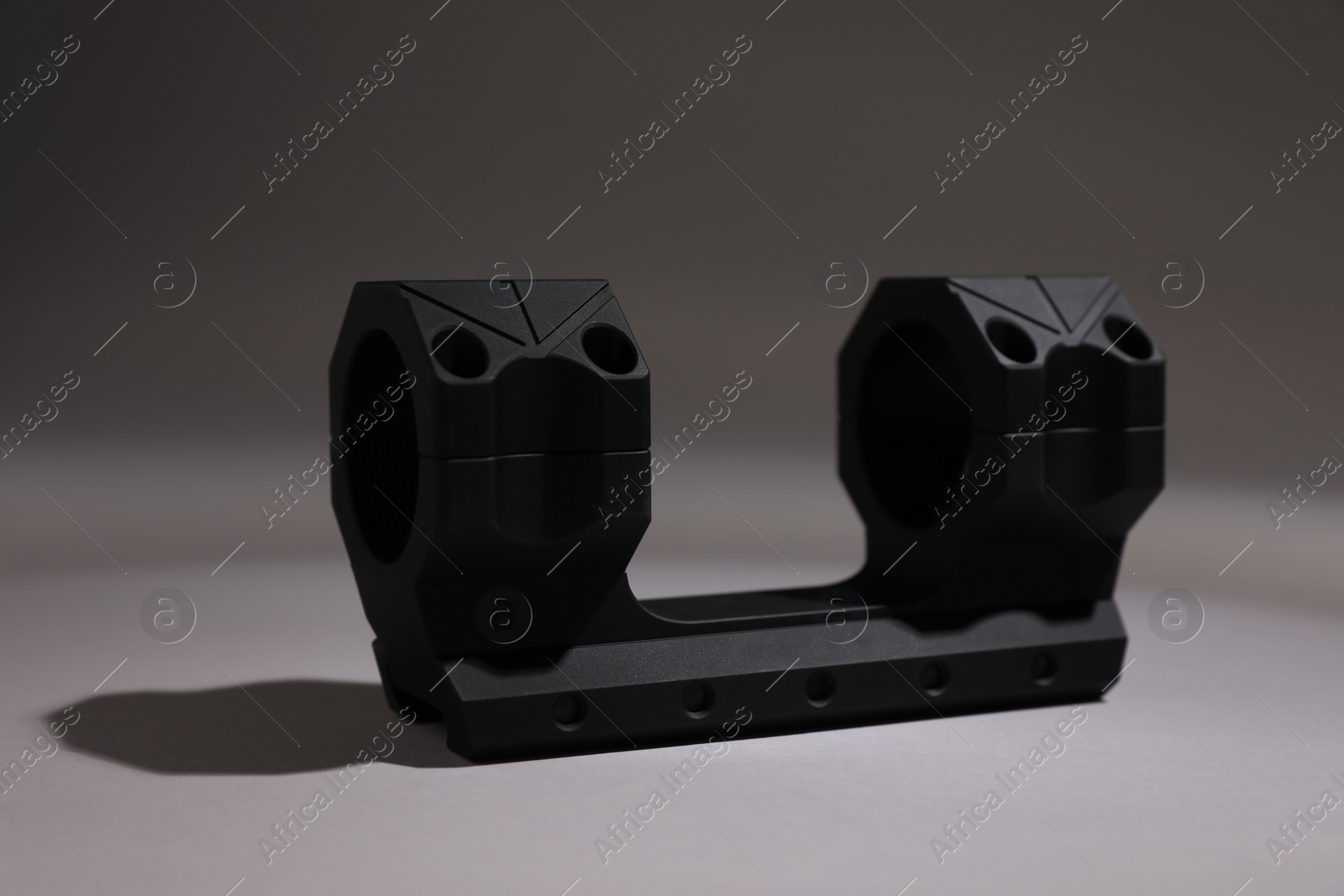 Photo of Quick disconnect sniper cantilever scope mount on grey background