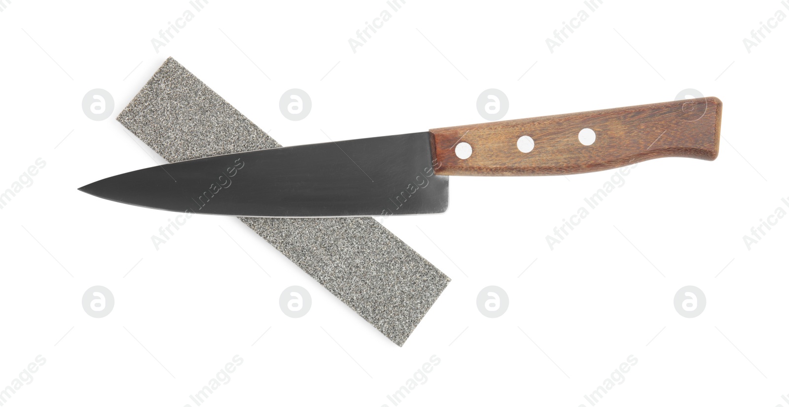 Photo of Sharpening stone and knife on white background, top view