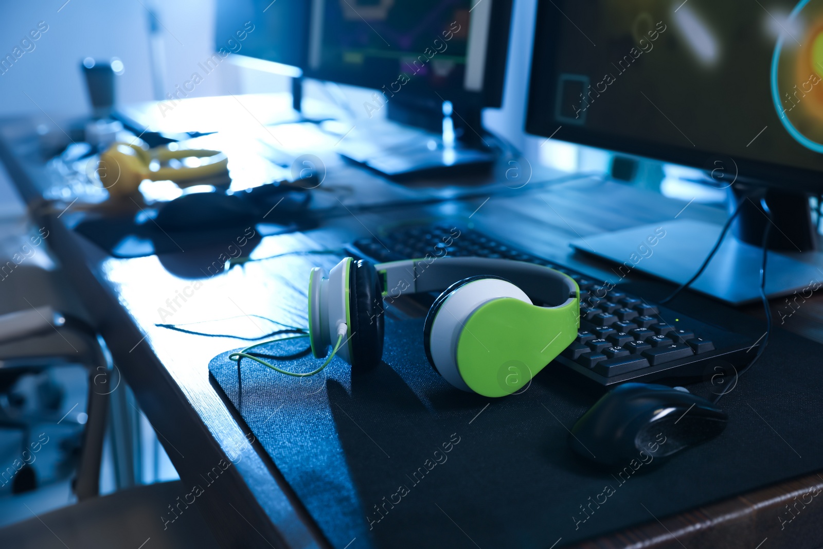 Photo of Internet cafe with modern computers for playing video games