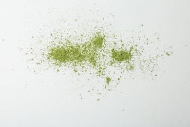 Powdered matcha tea on white background, top view