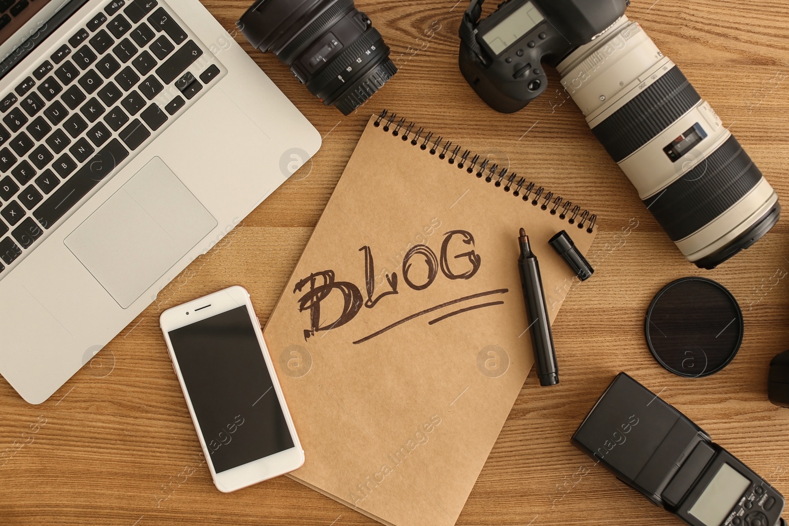 Photo of Flat lay composition with different blogger equipment on wooden background