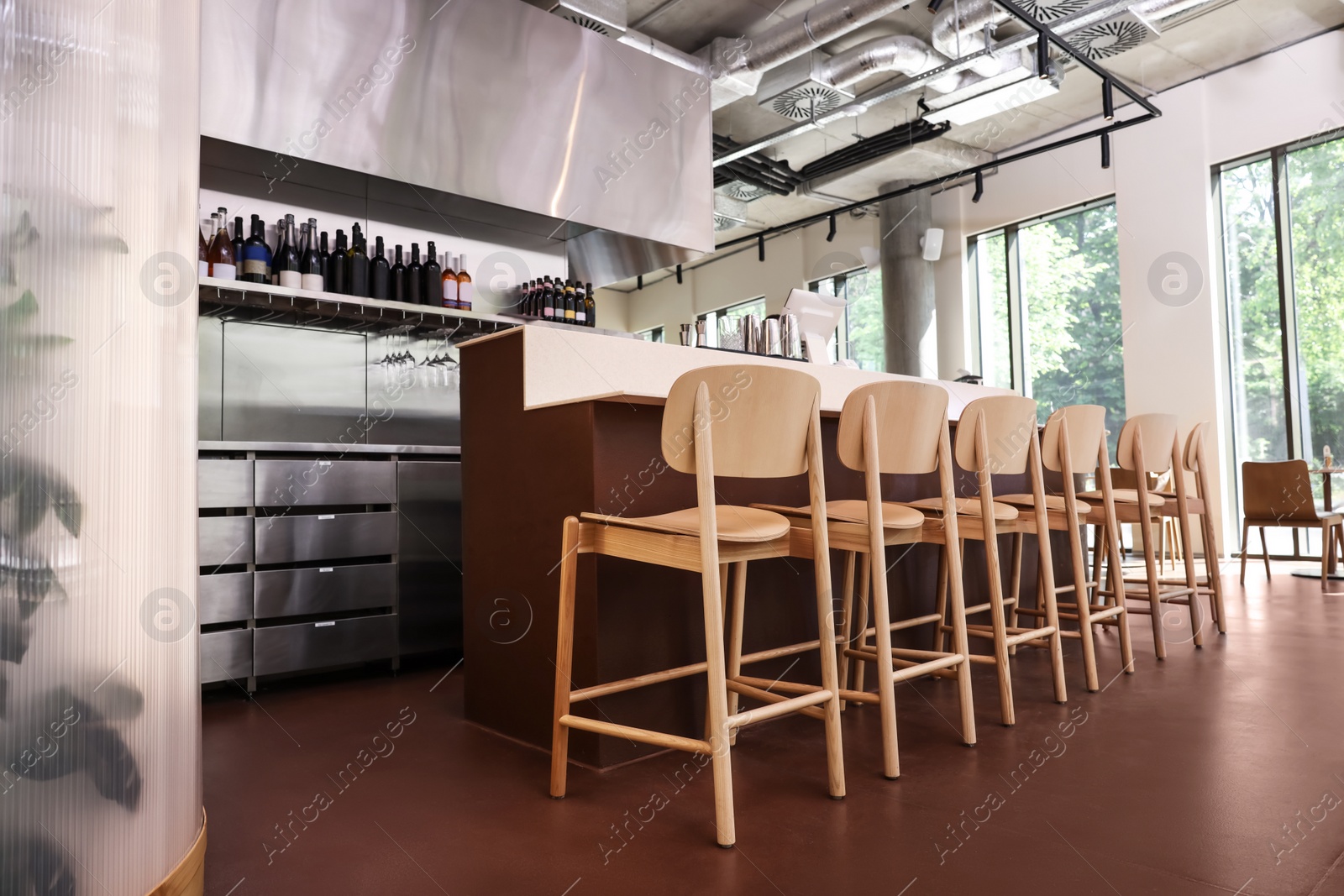 Photo of Modern cafe with stylish furniture. Interior design