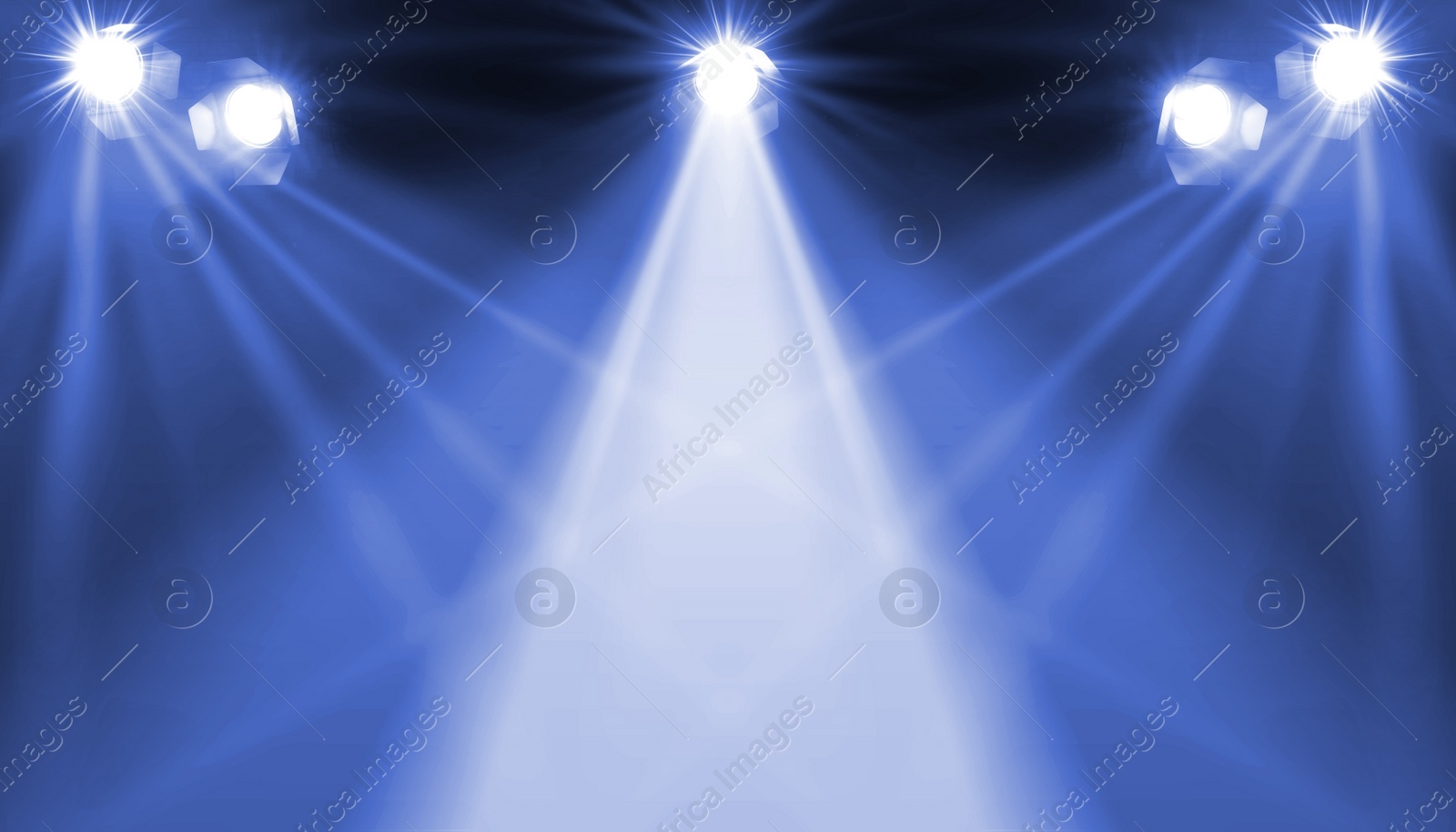 Image of Bright spotlights in darkness. Professional stage equipment