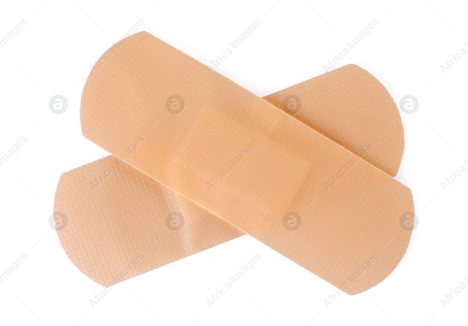 Photo of Medical adhesive bandages isolated on white, top view