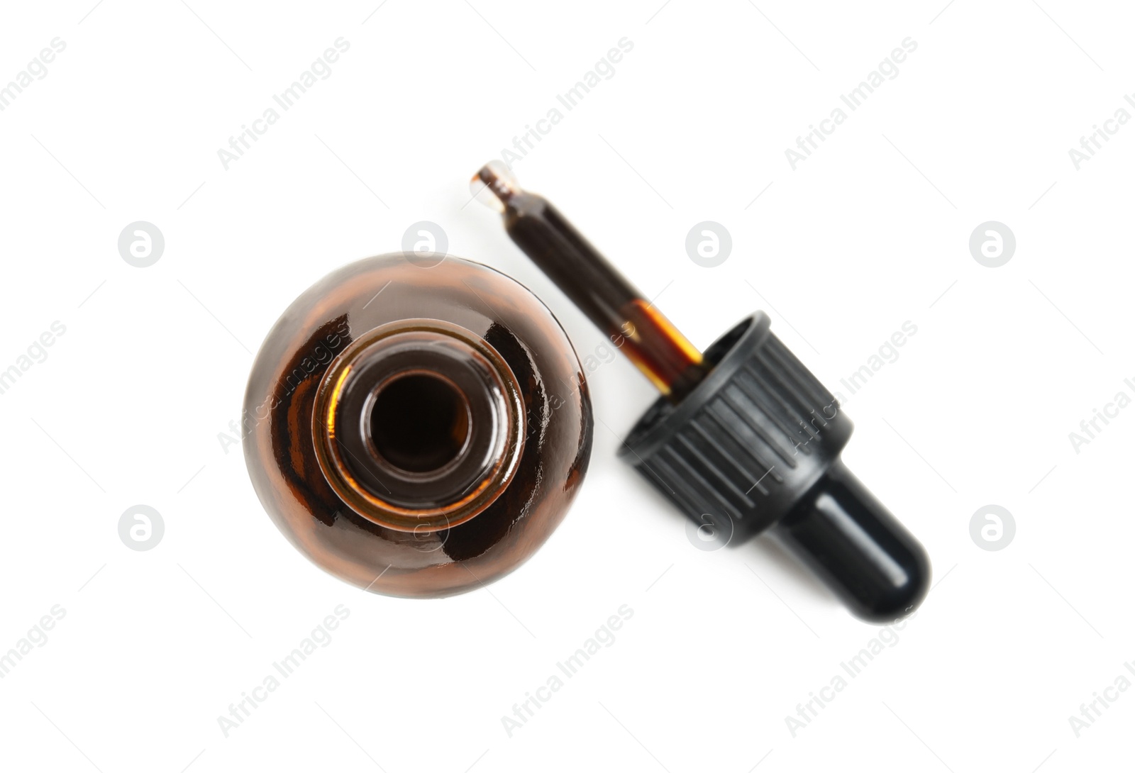 Photo of Bottle of medical iodine and dropper on white background, top view