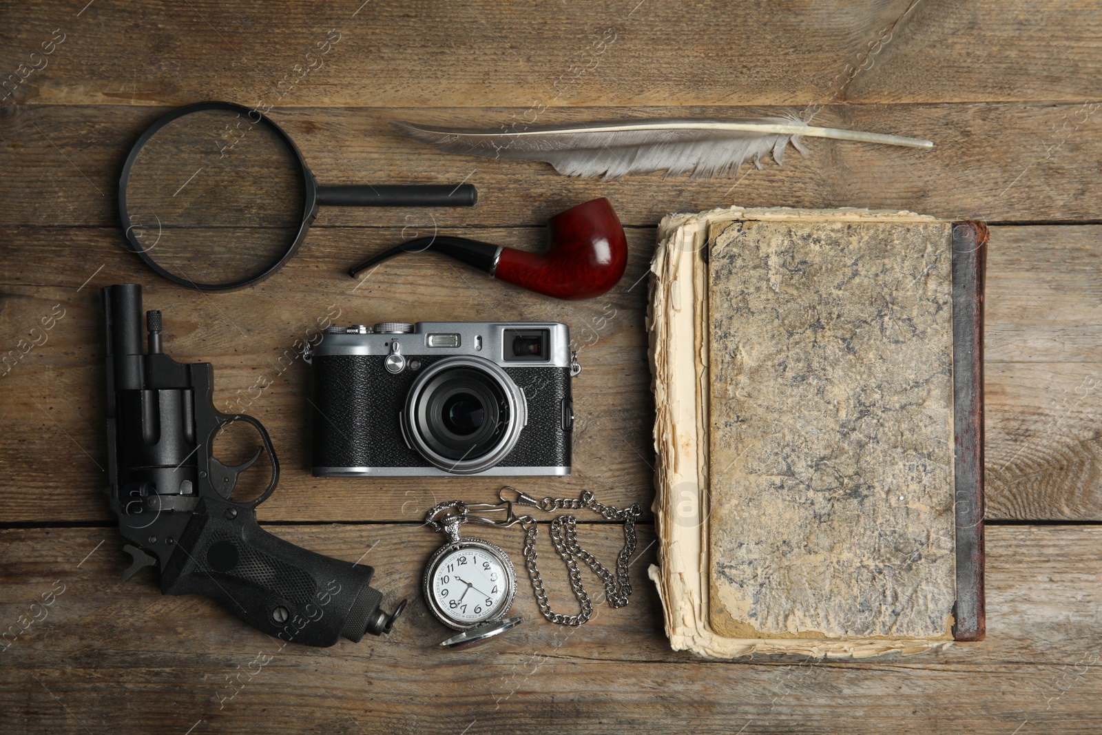 Photo of Flat lay composition with vintage detective items on wooden table