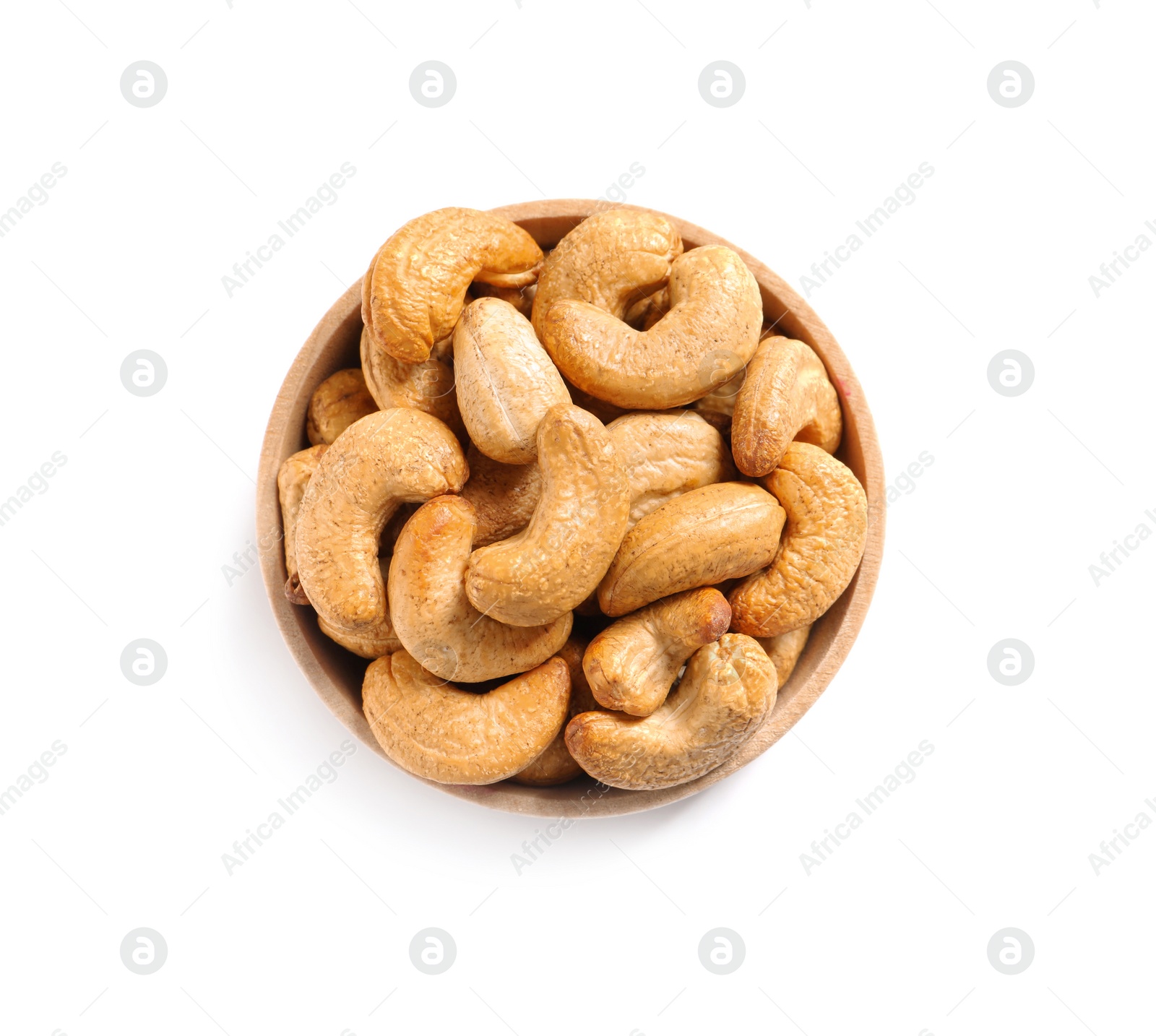 Photo of Tasty cashew nuts in bowl isolated on white, top view