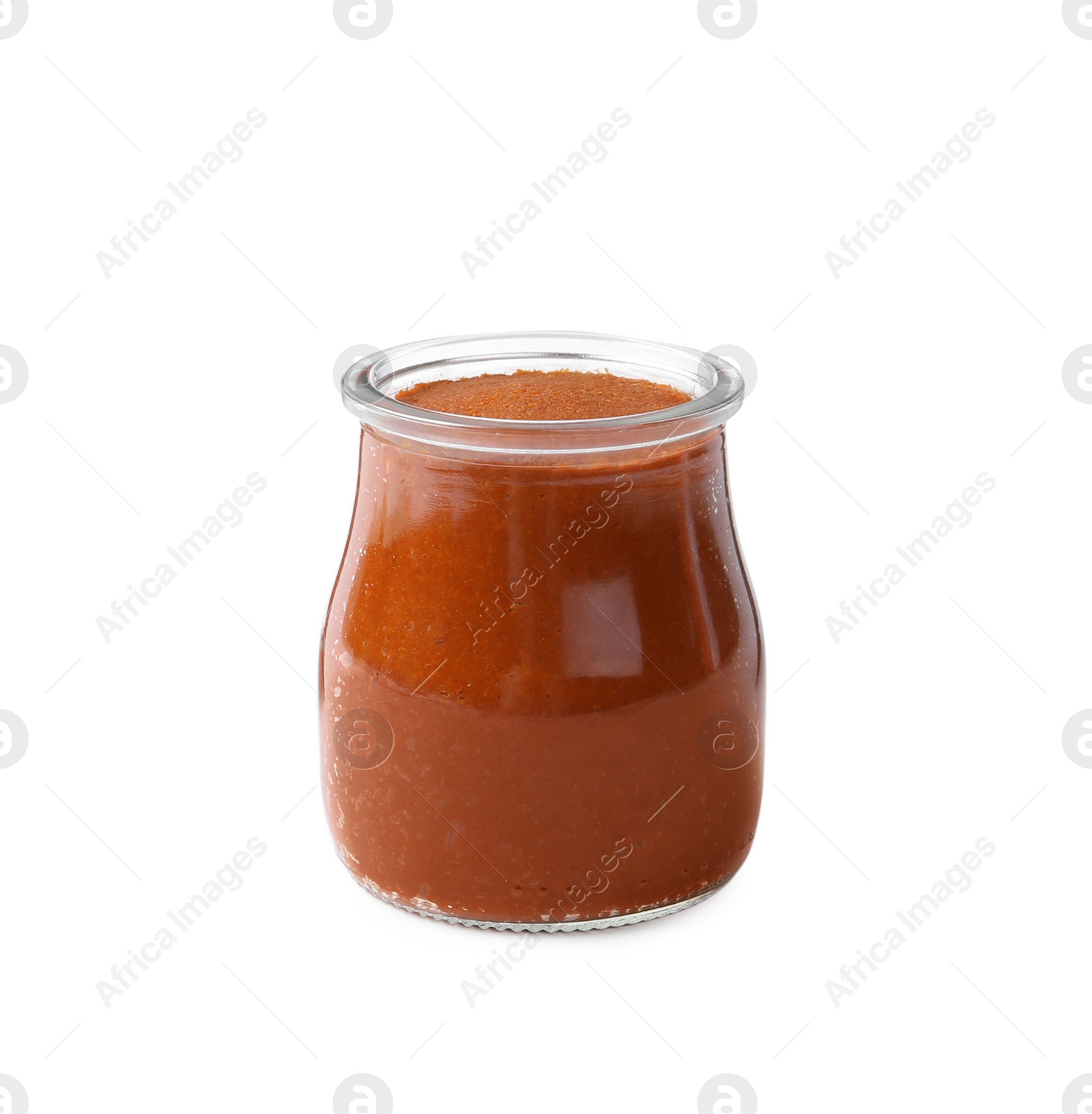 Photo of Red curry paste in glass jar isolated on white