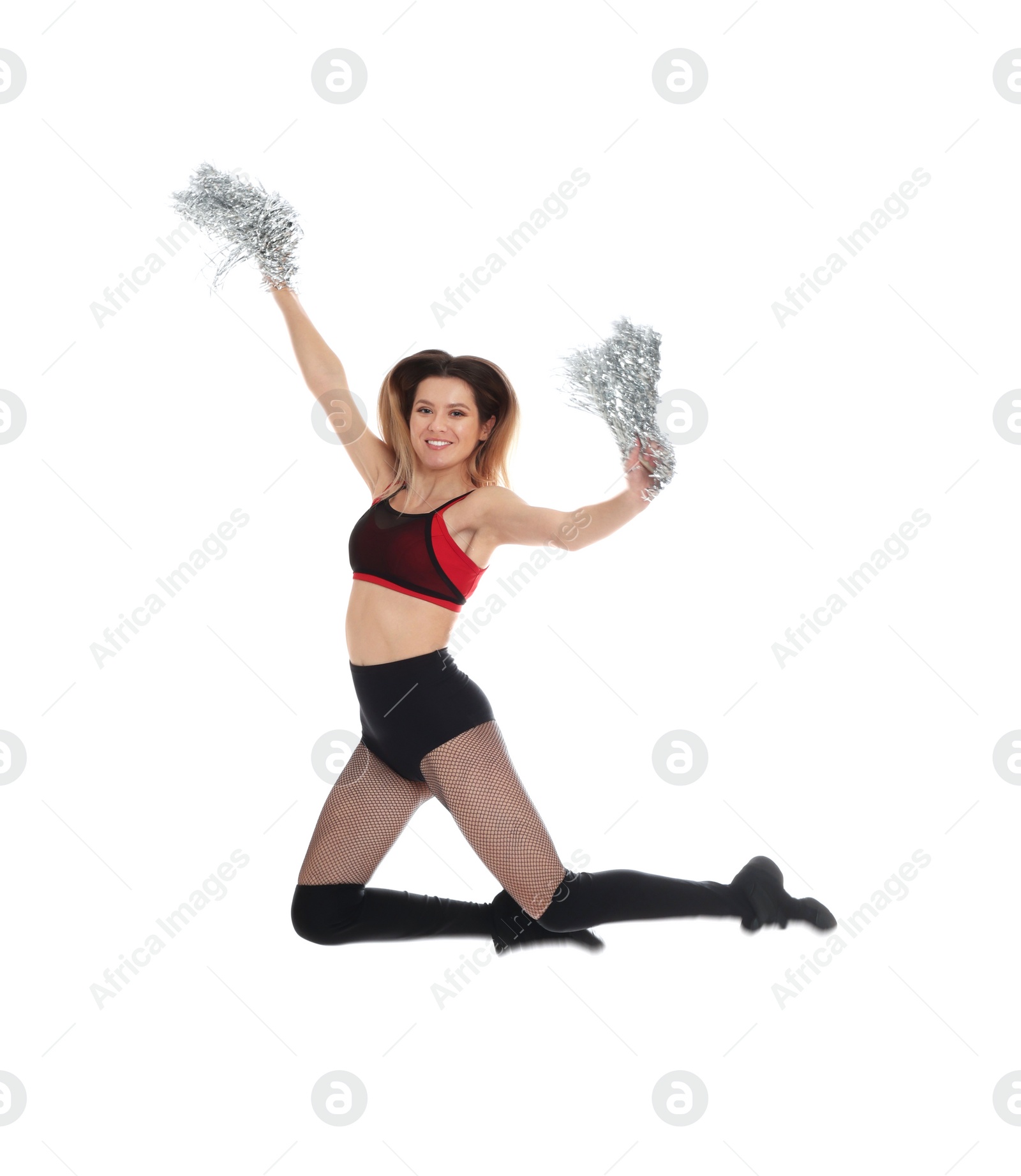 Photo of Beautiful cheerleader with pom poms jumping on white background